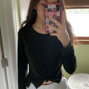 Black long sleeve top with a knot in the front.